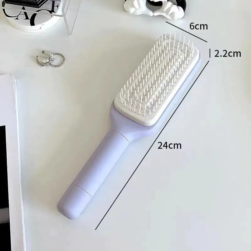 Brosse à cheveux antistatique autonettoyante 4 en 1